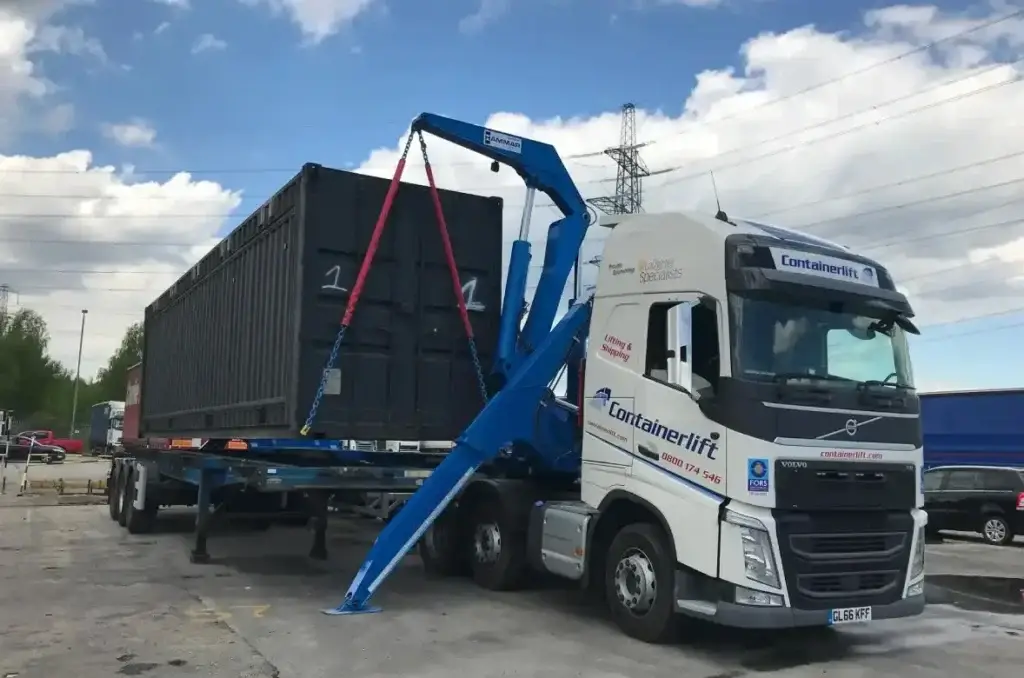 container delivery site with Containerlift container delivery insurance, container transport liability, who is responsible container delivery, shipping container insurance UK, container damage liability, freight insurance UK, container delivery risk, incoterms responsibility, cargo insurance container, container transport UK
